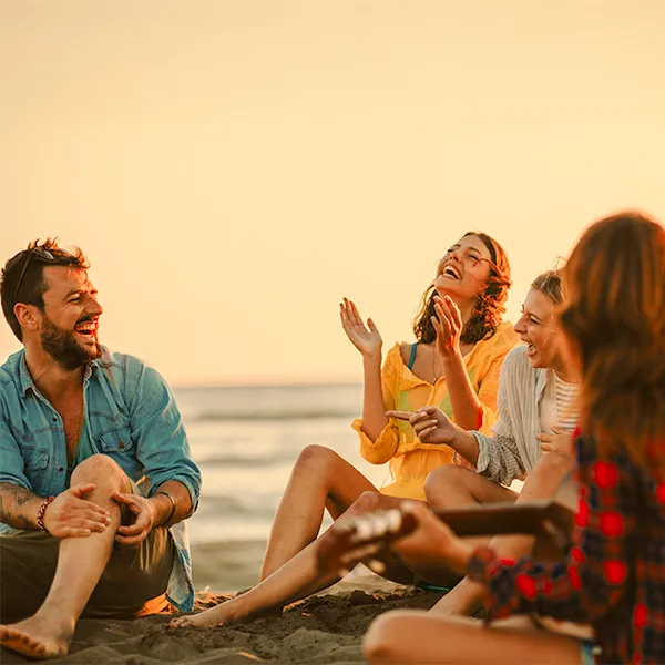 Friends enjoying the beach on the Costa Brava
